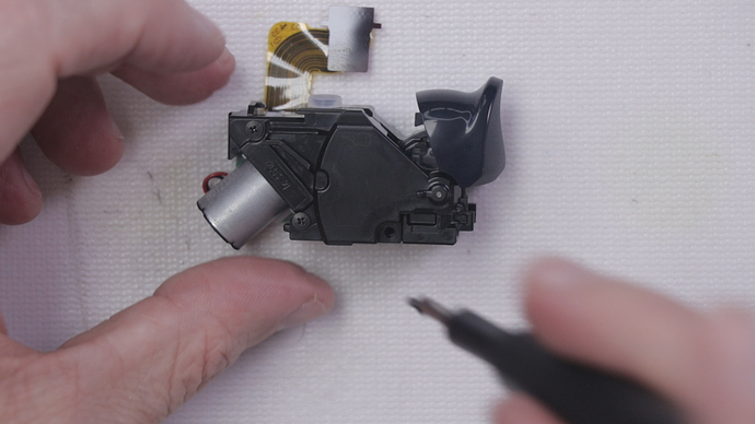 Step 13 - 4 Remove 4 Screws - 3 on one side 1 on the other