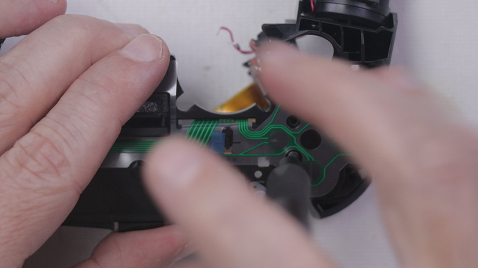 Step 14 - Remove Two Black Screws for Trigger