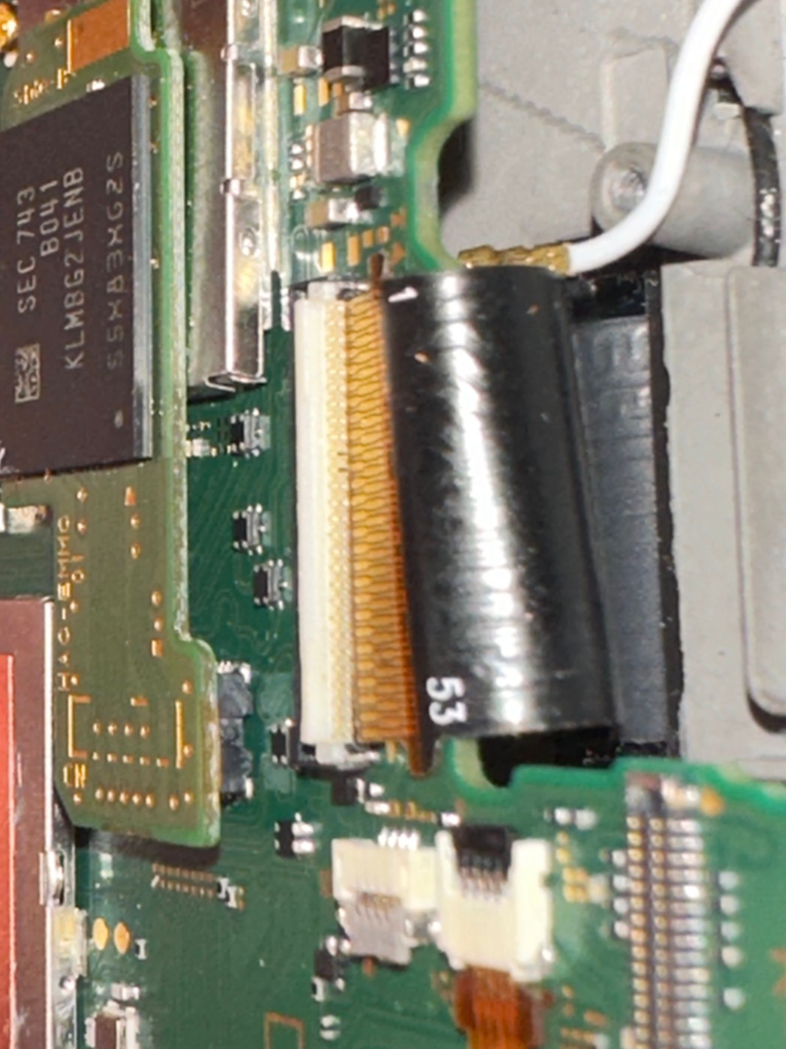 Nintendo Switch Shorted Caps next to MAX chip and under RAM
